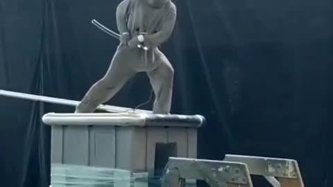 A live demonstration of electric discharge — samurai style