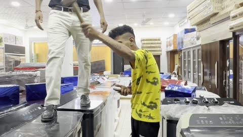 Man Falls While Running on Washing Machines