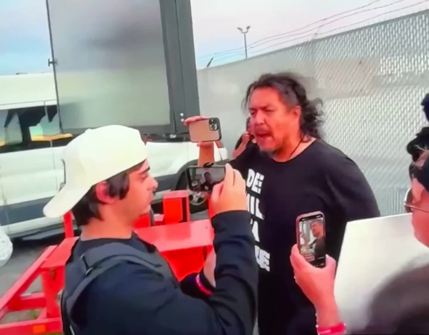 Leftists smacking my camera at the Broadview ICE facility…