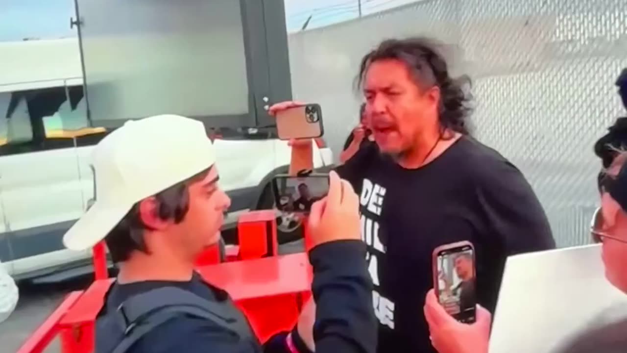 Leftists smacking my camera at the Broadview ICE facility…