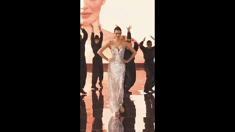 Kendall Jenner walking around the L'Oreal Paris show