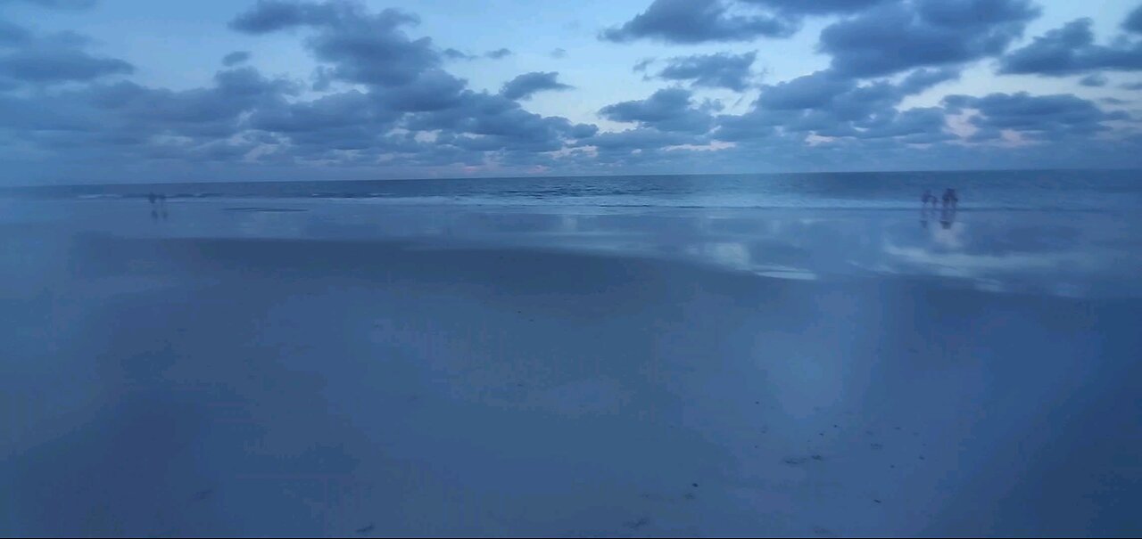 Evening Walk On The Beach