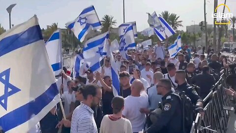 Elderly Palestinian Woman Assaulted by Israeli Settler During Jerusalem Day March