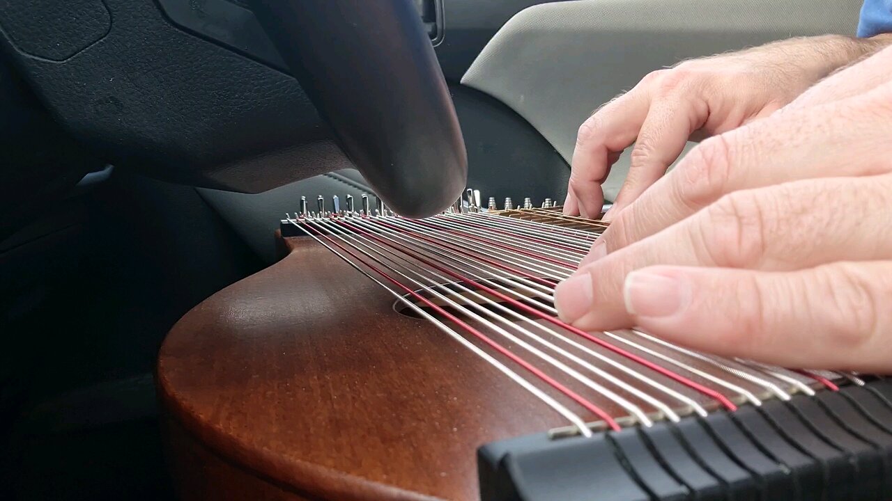 Practicing "This Old Man" on the zither!