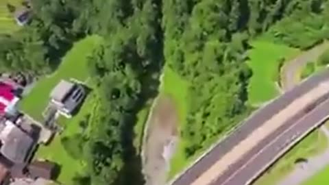 Base Jumping off of a Mountain in a Wing Suit