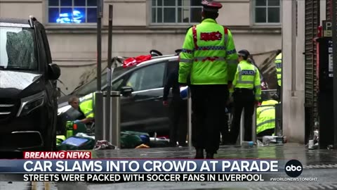 Car slams in crowd at Liverpool parade packed with soccer fans
