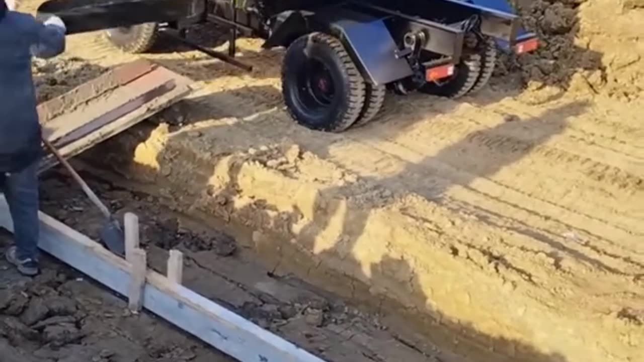 Pouring Concrete with a Small Dump Truck