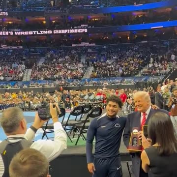 Carter Starocci wins his fifth NCAA D1 Wrestling Championship and shakes hands with President Donald J. Trump