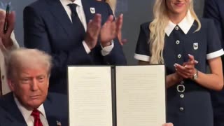 President Donald J. Trump signs an executive order establishing a task force for the 2028 Olympics in Los Angeles