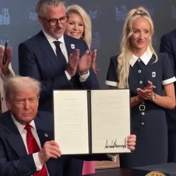 President Donald J. Trump signs an executive order establishing a task force for the 2028 Olympics in Los Angeles