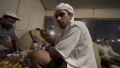 Omar bin joseph eating food with Indians