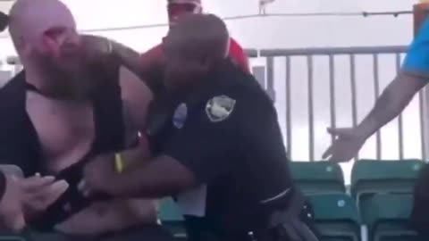Using your handcuffs as brass knuckles and repeatedly punch in the face an unarmed man.