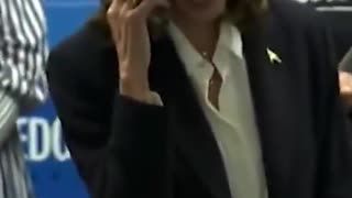 Kamala Harris caught pretending to be talking to a voter on the phone. exposed