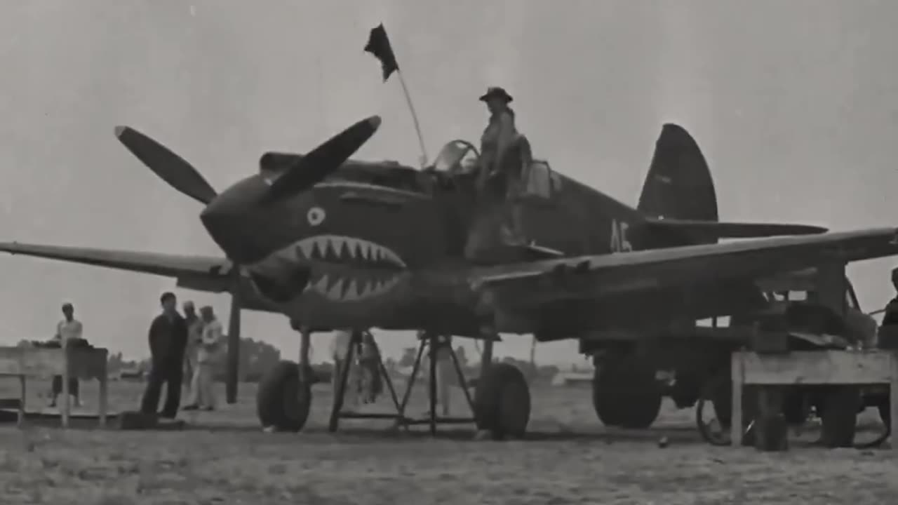 Gun alignment at the range for a "Flying Tiger" P-40B Warhawk