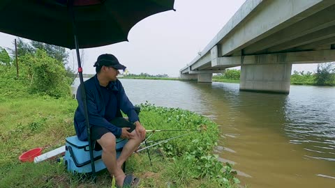 Eel Spin Fishing in River Muddy Shores