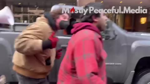 Anti-ICE thugs harass a man for wearing a hoodie that says "Freedom" and force him to take it off