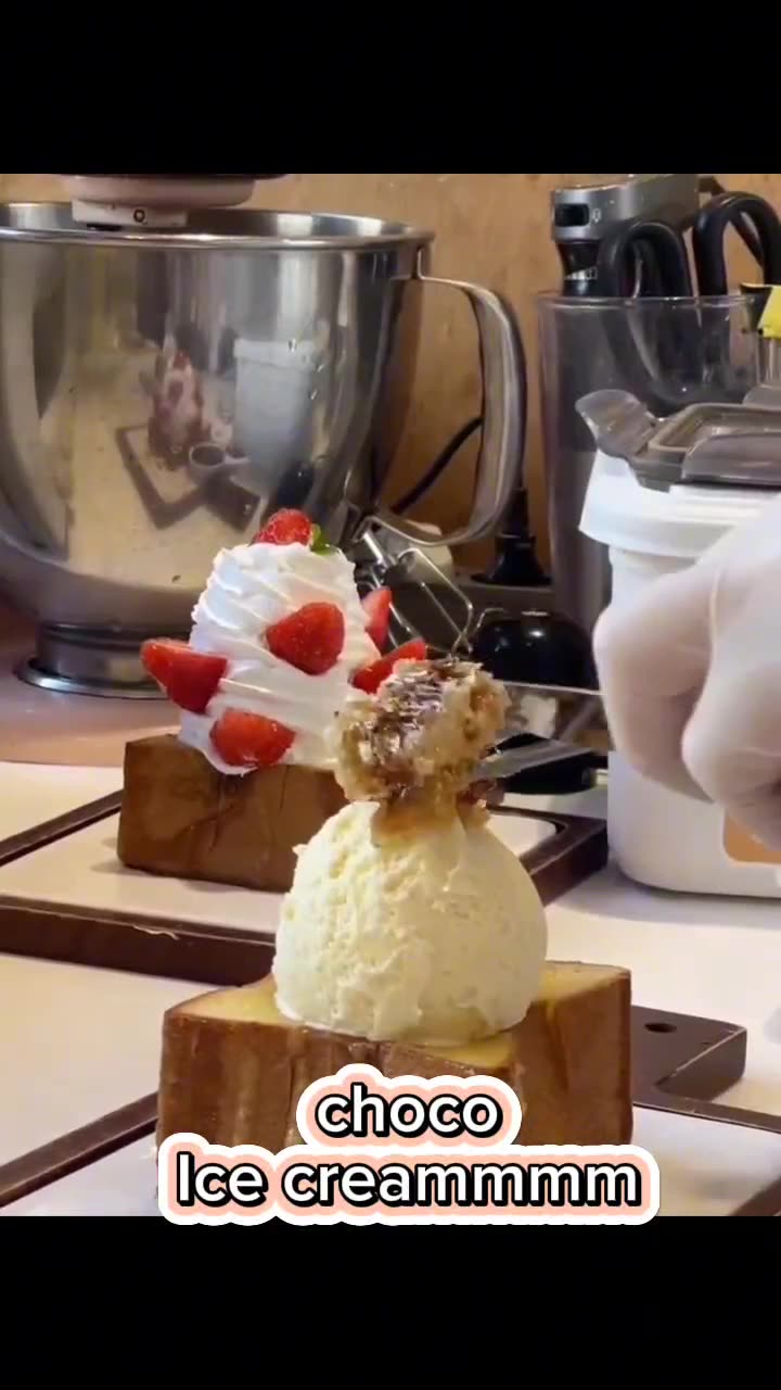 vanilla ice cream with choco topping or a toast with vanilla icecream ...