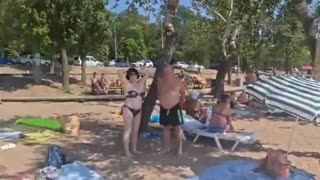 How Russia’s “Occupation” of Mariupol Really Looks — Ukrainians Chill on the Beach