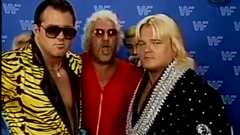Dream Team Interview of Brutus beefcake in yellow robe with black stripes & Greg valentine