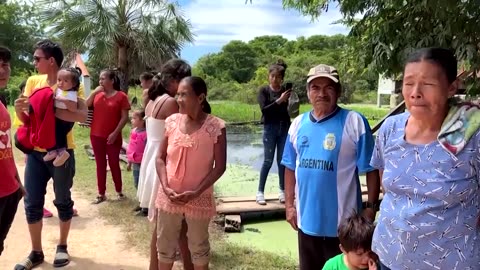 Families flee as Bolivian floods spark concerns over disease