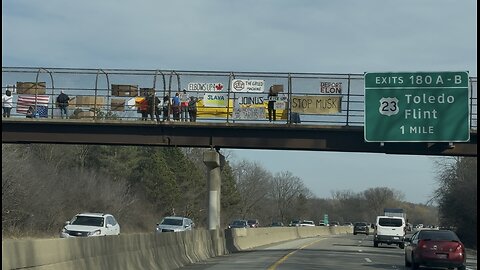 Anti-Trump & Anti-Elon Musk Demonstrators Out on Freeway Overpasses in Ann Arbor, Michigan