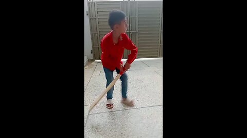 hashir Ali playing a cricket at home