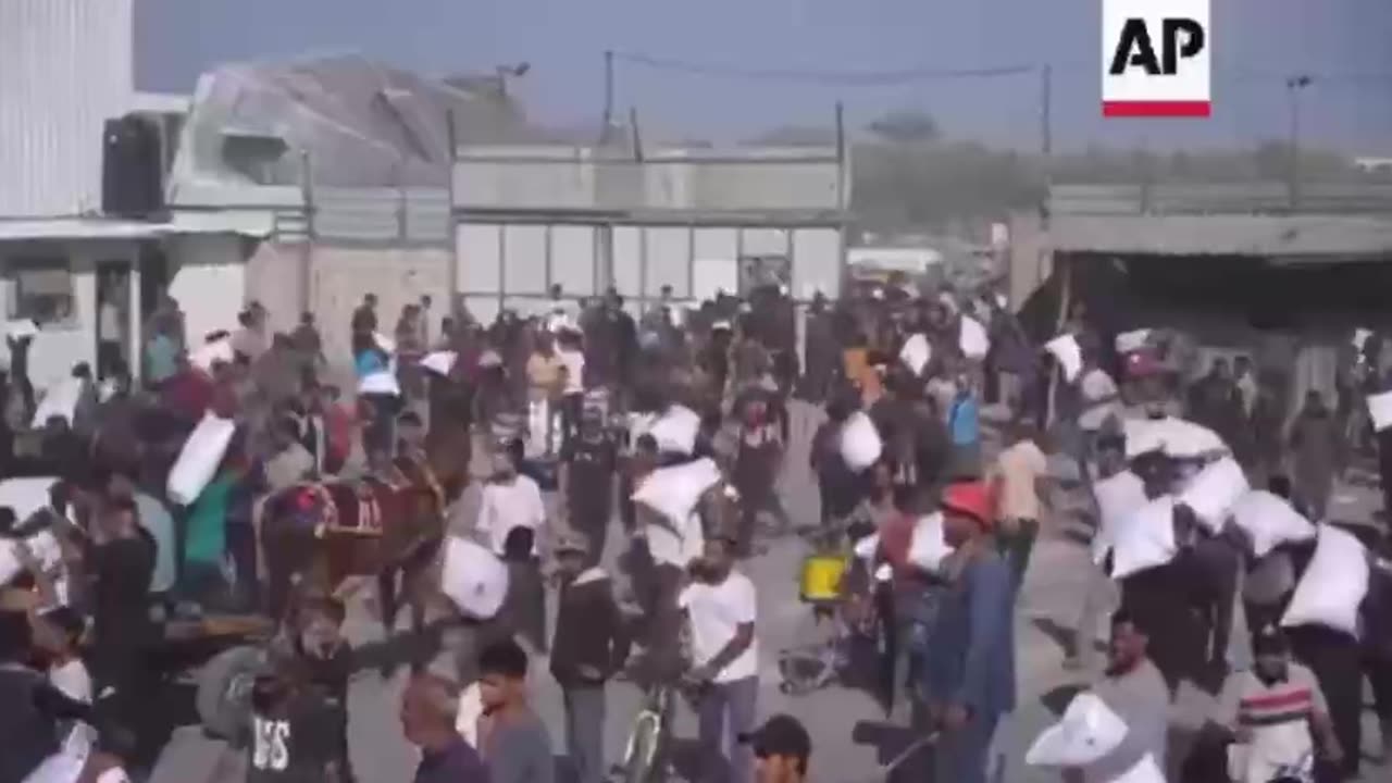 Hundreds of desperate Palestinians stormed into a U.N. World Food Program warehouse i