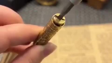 Old style sailor’s lighter shaped like a cigarette