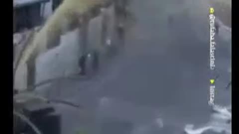 Zionist Spraying Shit on Homes in Jerusalem
