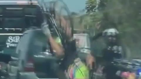 Bicycle rider collides with a parked police motorcycle in Carlsbad, California.