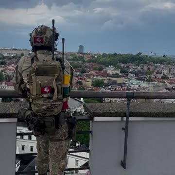 Lithuanian Special Forces Sniper Overlooking Military Parade in Capital of Vilnius