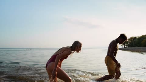 Couple Running Through Waves | Beach Adventure Moments 🌊❤️