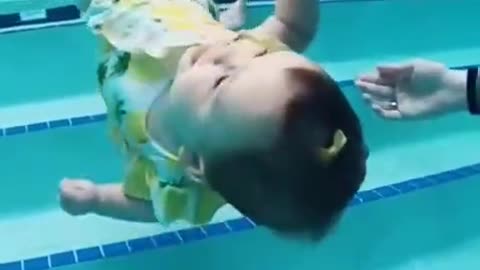 "Cutest Baby Swimmers You'll Ever See! 🏊‍♂️😍"
