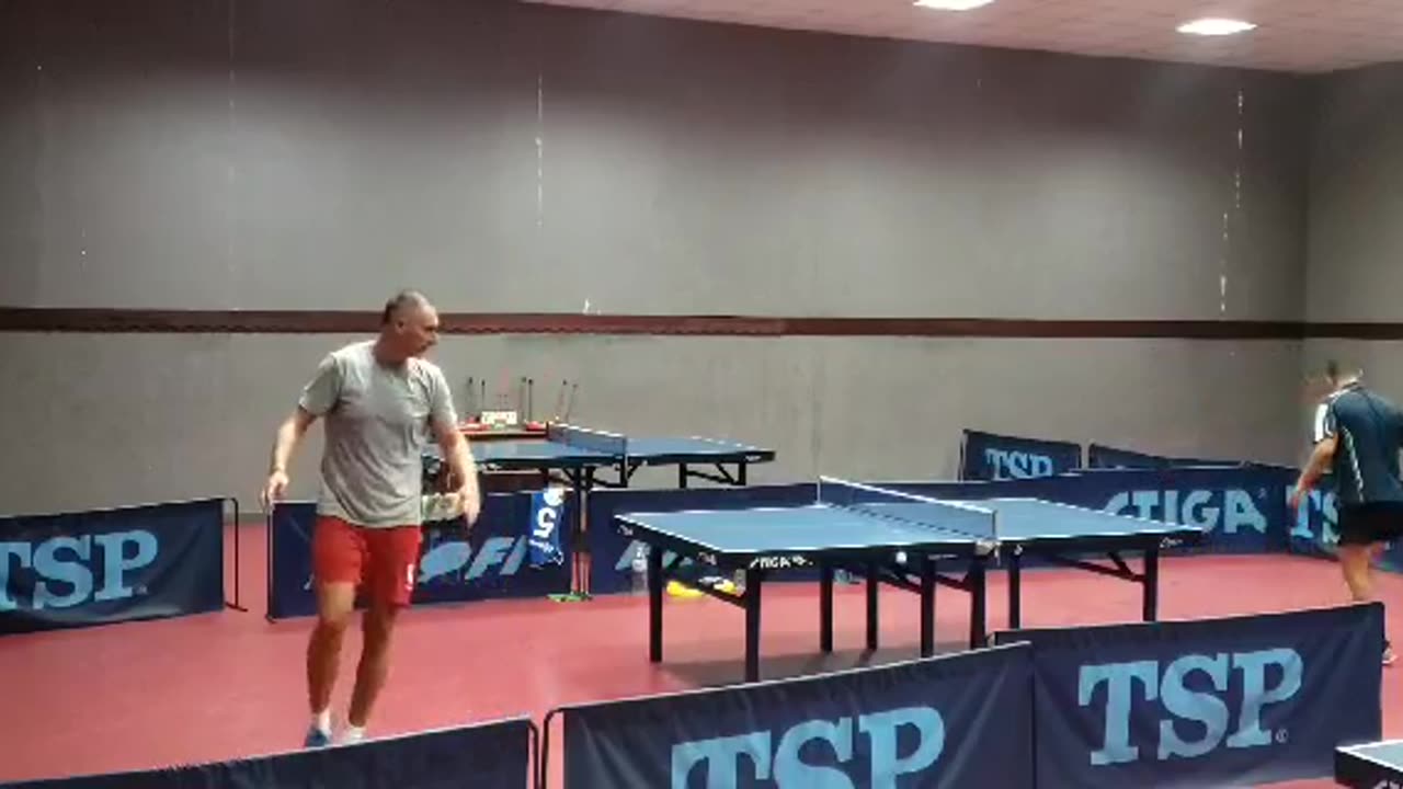 Player breaks his racket after losing a point