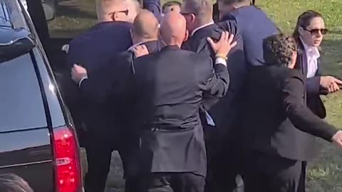 New footage of Secret Service rushing Trump to car