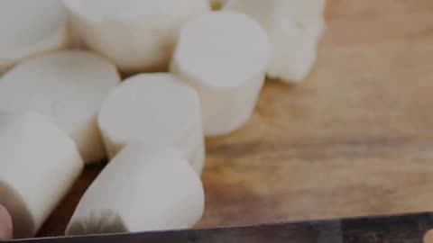 Making bread from cassava and cooking vegetables from cassava leaves