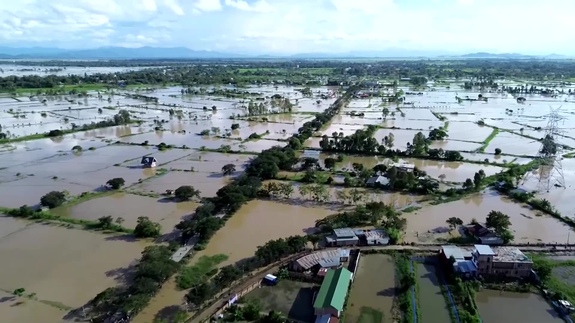 Indian village submerged as families seek shelter from floods