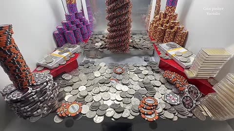 4 towers and a pile of gold high limit coin pusher