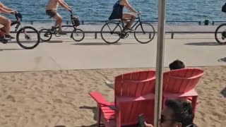 Toronto Canada. Naked men riding their bikes exposing themselves to children & families