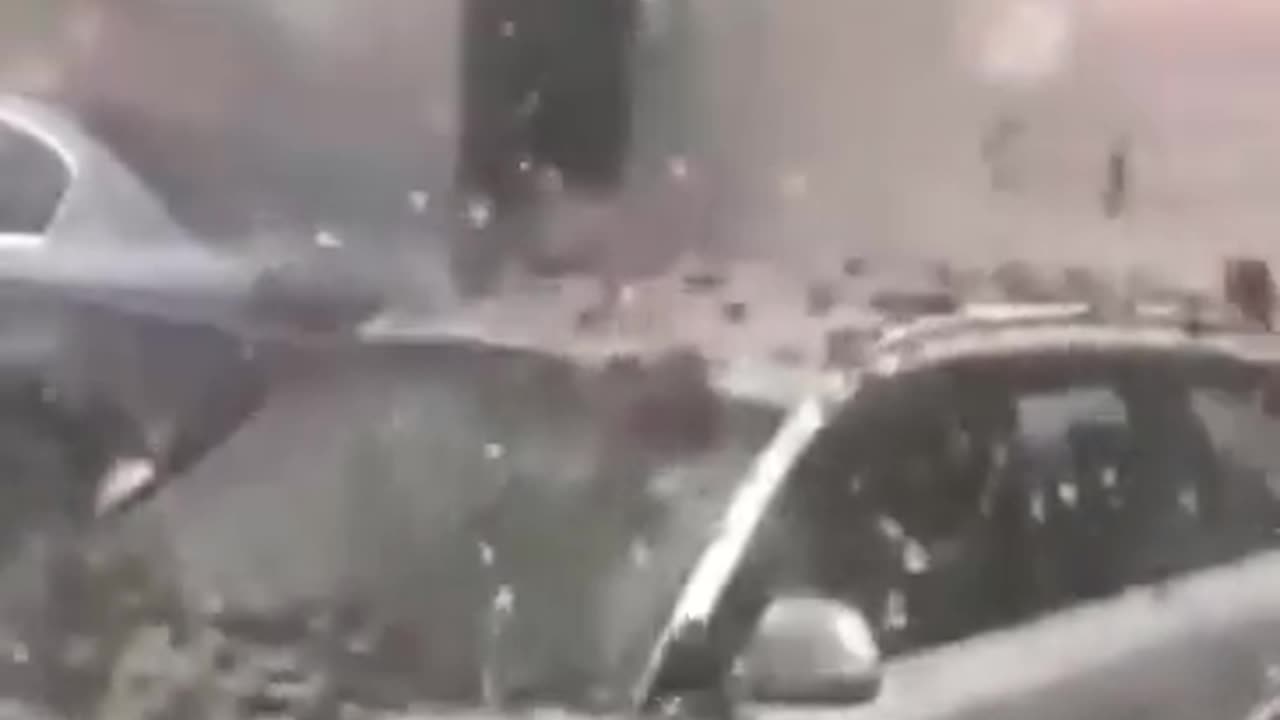 Massive mud hail size of an apple hammering down in Arkansas