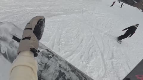 Snowboarder Learns About Not Slowing Down in the Terrain Park