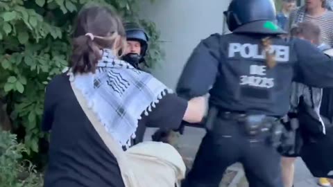 A young woman violently tackled by berlin police at a pro HAMAS protest