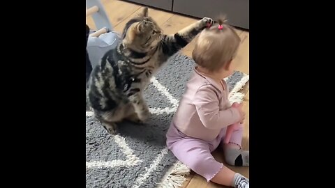 cat and baby very happy