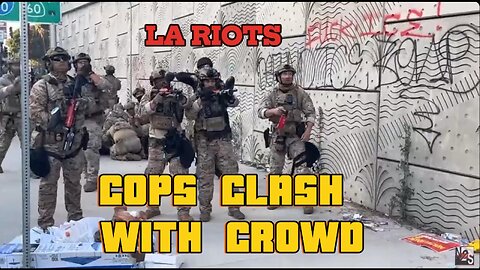 LA Riots: Cops clash with crowd