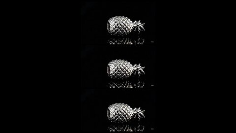 cutting a metal pineapple 2 - Google Veo 3