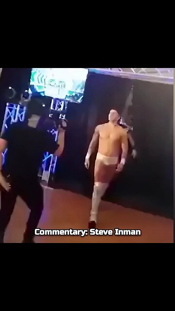 Wrestler spits on a kid, wrestler takes a beating from Dad.