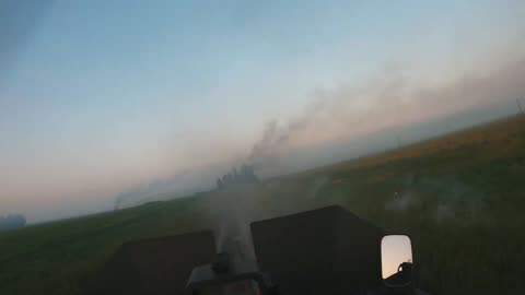 Ukrainian Machine Gunner Opens Fire from Atop Humvee with Browning M2