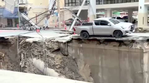 Video #4, In Thailand's capital Bangkok, road collapse occurred, burying parts of a busy street