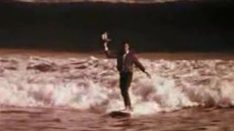 Commercial - Colt 45 Malt Liquor ( Guy sits at table on beach )