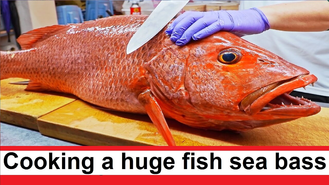 We carve and cook a huge fish sea bass